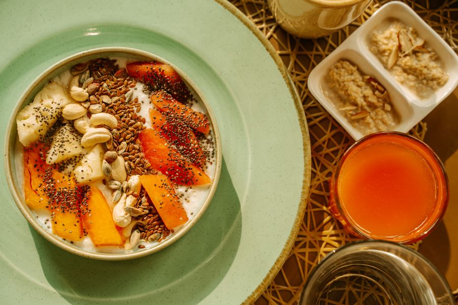 Vibrant breakfast bowl with yogurt, fruit, and seeds